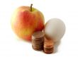 Red green apple and egg with coins