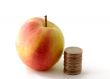 Red green apple with coins