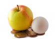 Red green apple and egg with coins