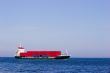 Cargo ship with red containers
