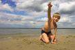 boy, sea and cloudy sky