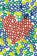 Colorful beads surrounding red heart
