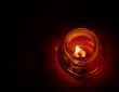 Candle in darkness
