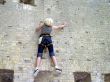 Hard brick wall and girl