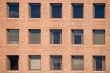 Office windows in the brick wall