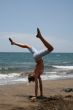 girl, a gymnastics at the seashore