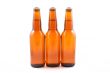 three bottles of beer isolated on white