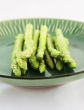 Fresh asparagus shoots on a plate