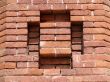 Brick wall of a triumphal arch. Barcelona