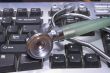 A stethoscope on a computer Keyboard.