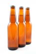 three bottles of beer isolated on white