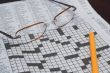 a daily crossword puzzle in a newspaper