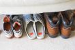 a families shoes lined up in a row