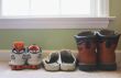 a families shoes lined up in a row