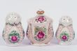 two saltshakers and  mustard-pot