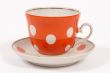 orange tea cup