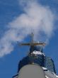 Church Crosses inside white cloud on blue sky