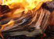 burning stack of paper sheets