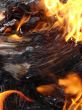burning stack of paper sheets