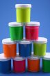 colorful paints close-ups blue background