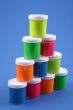 colorful paints close-ups blue background