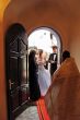 Wedding Couple in Orthodox Cathedral doorway