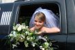 Happy Bride in limousine window