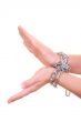 two hands with chain isolated on white