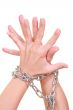 two hands with chain isolated on white