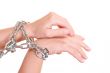 two hands with chain isolated on white