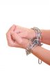 two hands with chain isolated on white