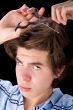 Boy cutting his hair 2