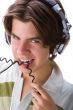 Boy biting a cable