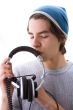 Boy kissing his headphones