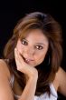 Beautiful woman with hand on face