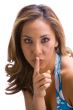 Brunette with finger on face