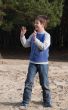 Boy playing with opened hands