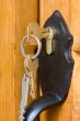 Door handle and keys. Shallow depth of field.