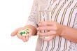 woman with lots of pills