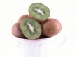 fresh, green kiwi in big cup