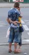 Young pair dating at town street