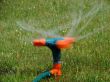 Moving streams sprayer watering lawn