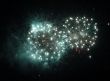 Night celebration fireworks upon dark sky