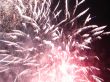Night celebration fireworks upon dark sky
