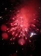 Night celebration fireworks upon dark sky