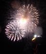 Night celebration fireworks upon dark sky