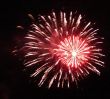 Night celebration fireworks upon dark sky