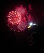 Night celebration fireworks upon dark sky