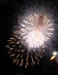 Night celebration fireworks upon dark sky