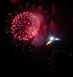 Night celebration fireworks upon dark sky